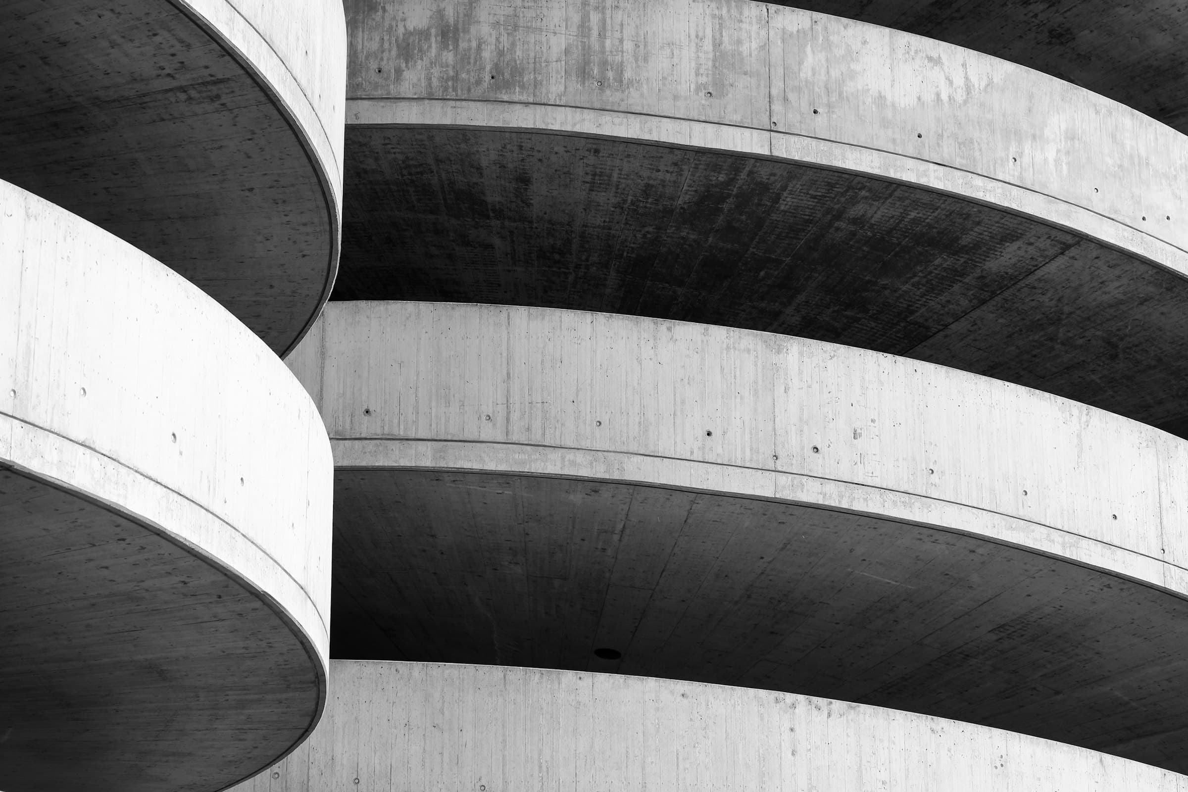 Curved concrete architecture in black and white