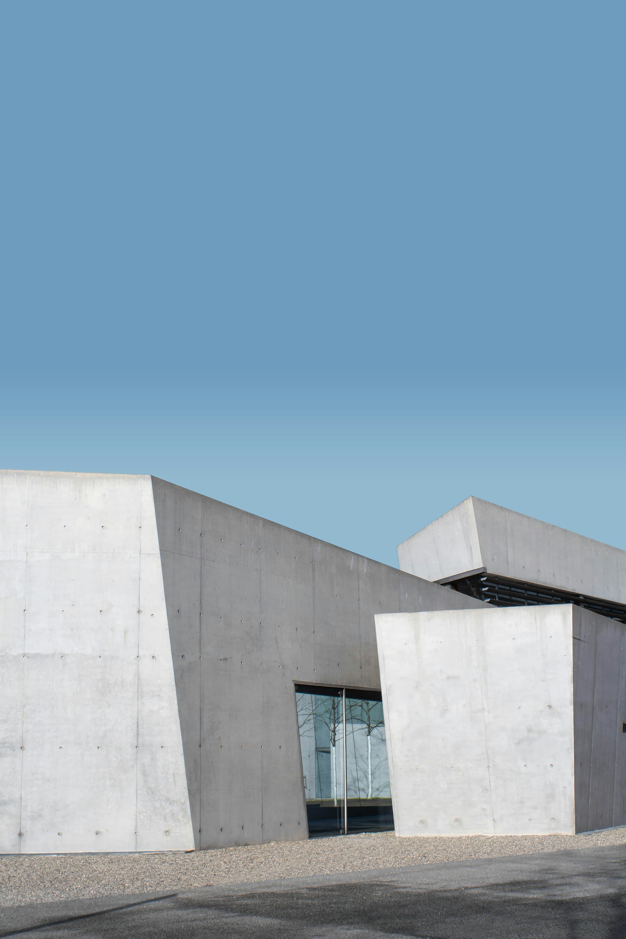 White concrete architecture against a clear sky